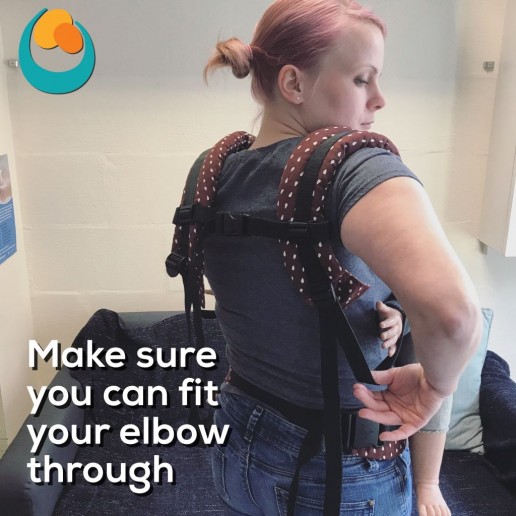 Back carry with a rucksack carrier photo tutorial from Carrying Matters